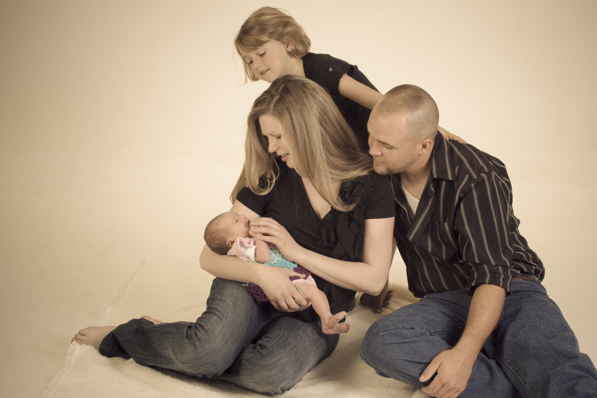 Family portrait with a newborn