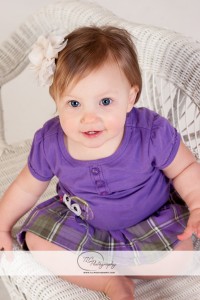 Baby girl in purple